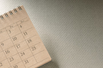 Calendar.On Blank desk.