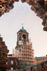 View at the clock tower from a window of destroyed church