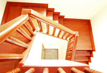 Interior work of wooden stairs and handrail