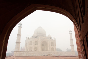 Fototapeta na wymiar Framing of Taj Mahal mausoleum in a foggy morning
