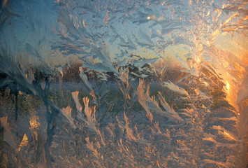 Fototapeta na wymiar Frosty pattern on window