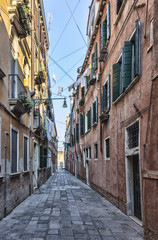 Fototapeta na wymiar Narrow Venetian Street