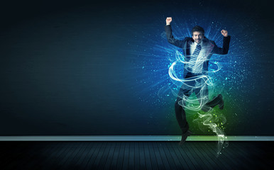 Talented cheerful businessman jumping with glowing energy lines