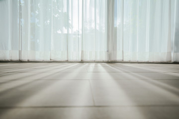 Shadow from shining through a window and the curtains