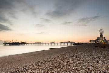 Fototapeta na wymiar Brighton at sunset with the pier in silhouette