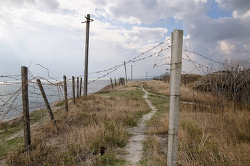 Fototapeta premium Barbed wire in the fortress of Kerch (Fort Totleben)