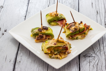 Zucchini and bacon rolls baked