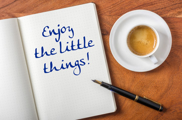 Notebook on a desk - Enjoy the little things
