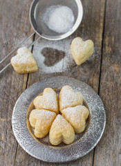homemade biscuits in the form of hearts. shallow depth of field