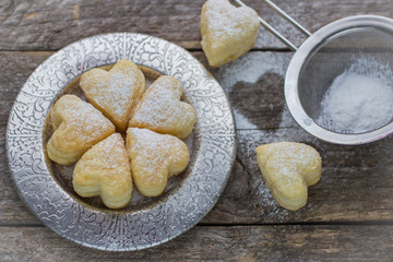 homemade biscuits in the form of hearts. shallow depth of field
