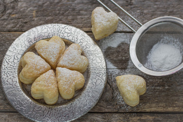 homemade biscuits in the form of hearts. shallow depth of field