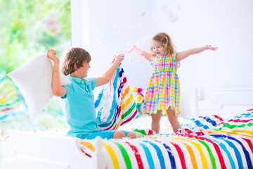 Kids having pillow fight