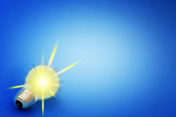 Background with lit lightbulb