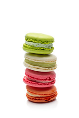 Sweet and colourful french macaroons on a white background