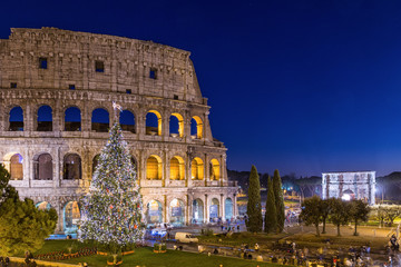 Naklejka premium Colosseum in Rome at Christmas during sunset, Italy