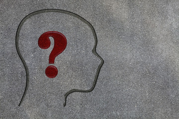 Human brain open with question mark