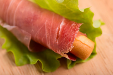smoked speck prosciutto - selective focus