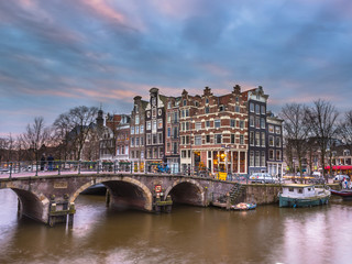 Canal houses sunset Amsterdam