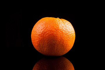 .Orange fruit isolated on a black background