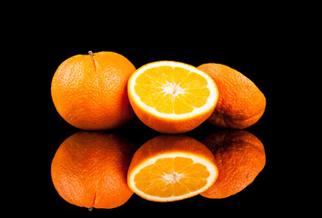 .Orange fruit isolated on a black background