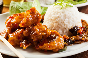 Fried chicken pieces with sweet and sour sauce