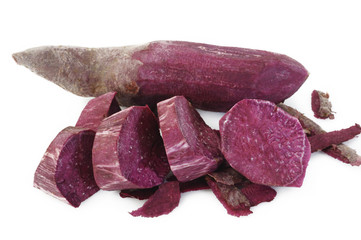 Obraz premium Purple sweet potatoes on white background