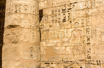 Fototapeta na wymiar Ancient carvings in the Mortuary Temple of Ramses III. near Luxo
