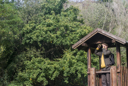 Senior Man With Binoculars