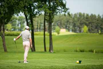 Man playing golf