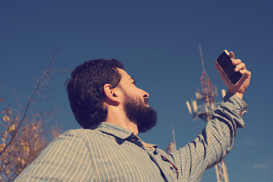 Hipster looking for phone coverage