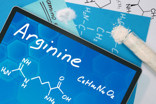 Tablet with the chemical formula of  Arginine . Amino acids.