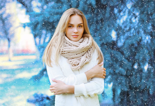 Christmas, winter and people concept - beautiful woman outdoors