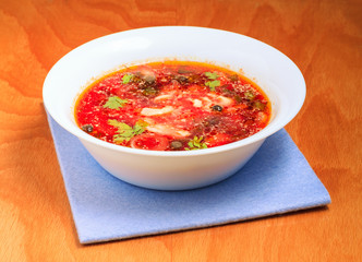 Vegetable soup in a bowl on the table