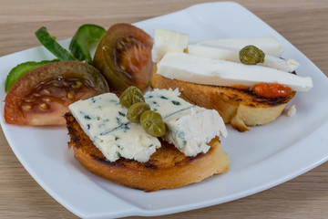 Tapas with soft cheese