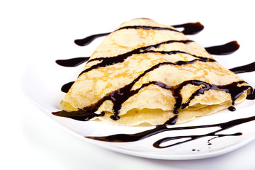 Pancake with chocolate and ice cream.
