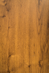 Close view of dark brown wood background.