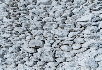 Obraz premium White stone wall texture background.