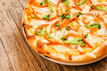 pizza on wooden background
