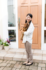 asian woman and dog lifestyle image