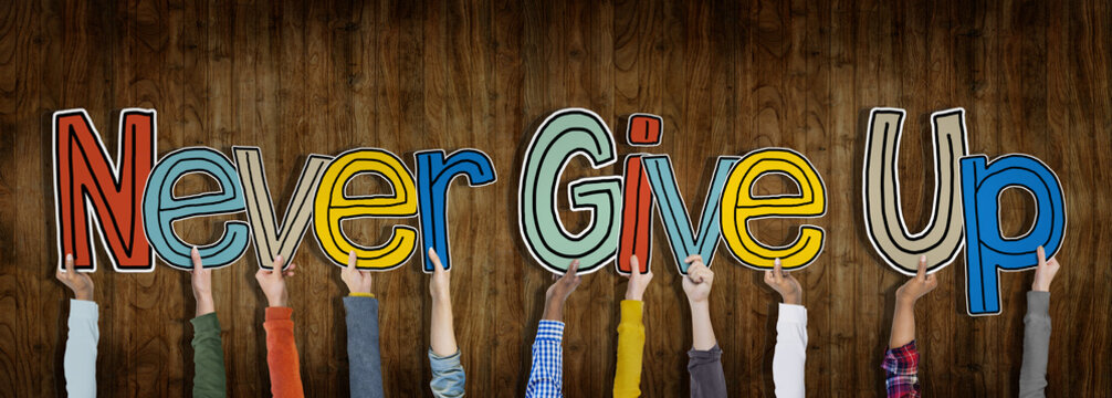 Hands Holding Never Give Up Word Concept