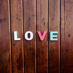 word love on the wooden table