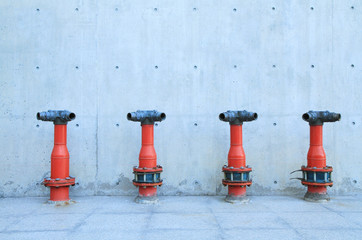 Row of red water plugs