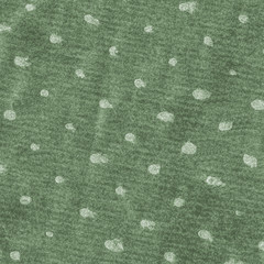 green textured background, light spots