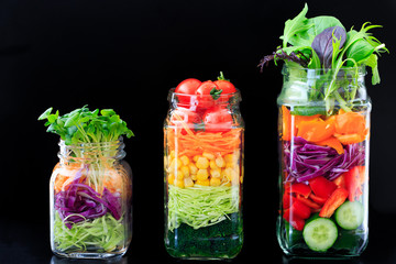 fresh colorful salad in the jar