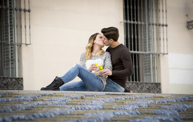 young couple in love on street on Valentines Champagne toast