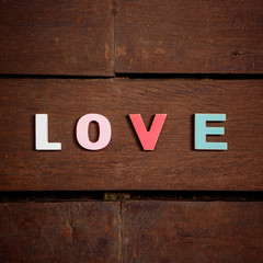 word love on the wooden floor