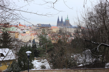 First Snow in Prague City with gothic Castle, Czech Republic