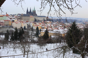 First Snow in Prague City with gothic Castle, Czech Republic