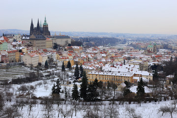 First Snow in Prague City with gothic Castle, Czech Republic