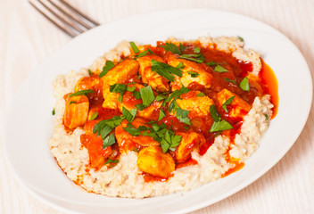 chicken breast with tomato sauce and oatmeal
